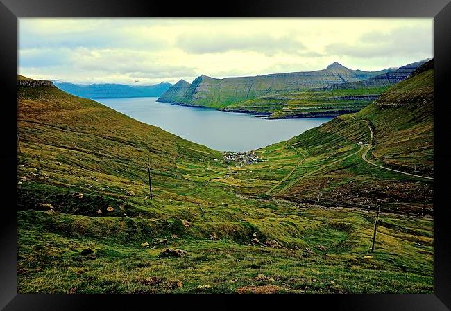 Mountains and sea in the Faroe Islands  Framed Print by Sue Bottomley