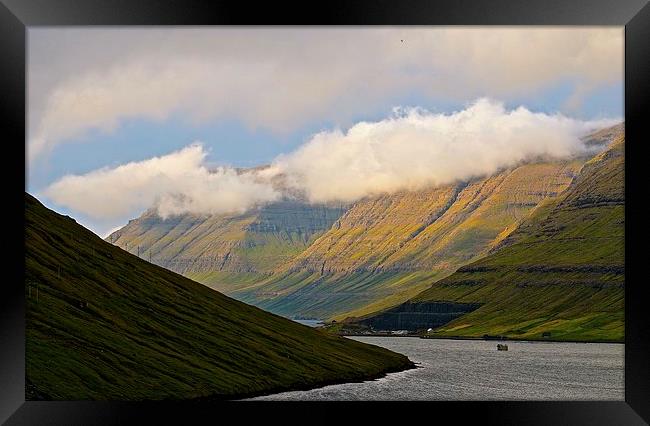 Leaving the Faroe Islands by Sea  Framed Print by Sue Bottomley