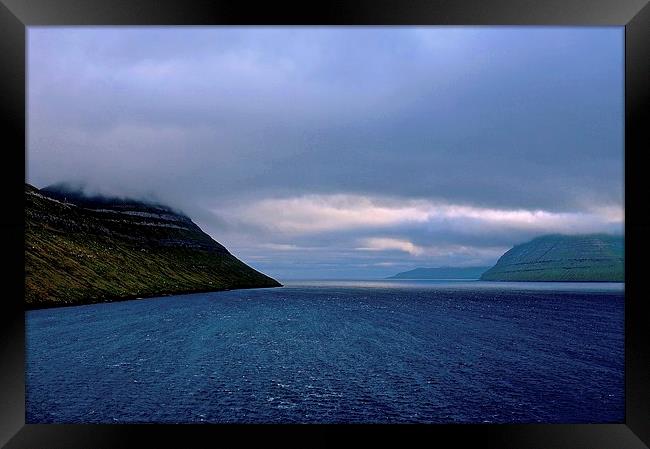 Leaving the Faroe Islands by Sea  Framed Print by Sue Bottomley