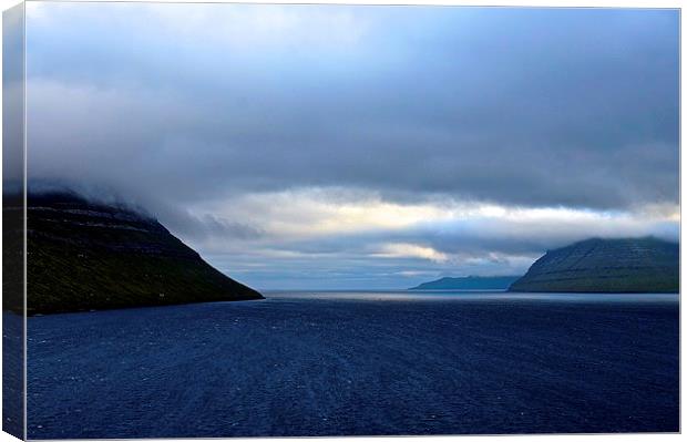 Leaving the Faroe Islands by Sea  Canvas Print by Sue Bottomley