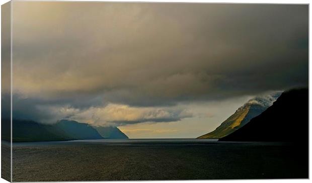  Leaving the Faroe Islands by Sea Canvas Print by Sue Bottomley