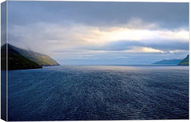 Leaving the Faroe Islands by Sea  Canvas Print by Sue Bottomley