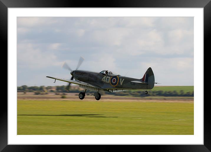 Spitfire TE311Grass Landing Framed Mounted Print by J Biggadike