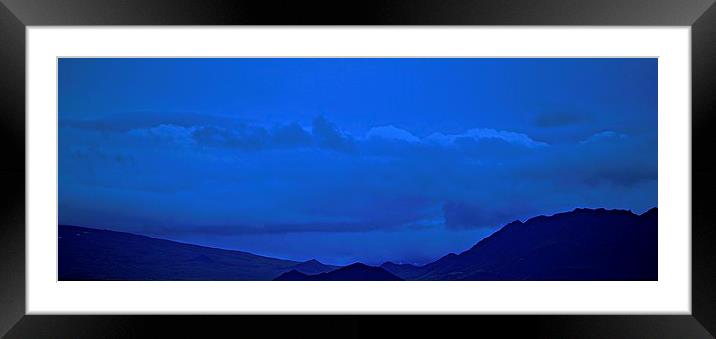  Blue skies over Silhouetted Mountains in Iceland Framed Mounted Print by Sue Bottomley