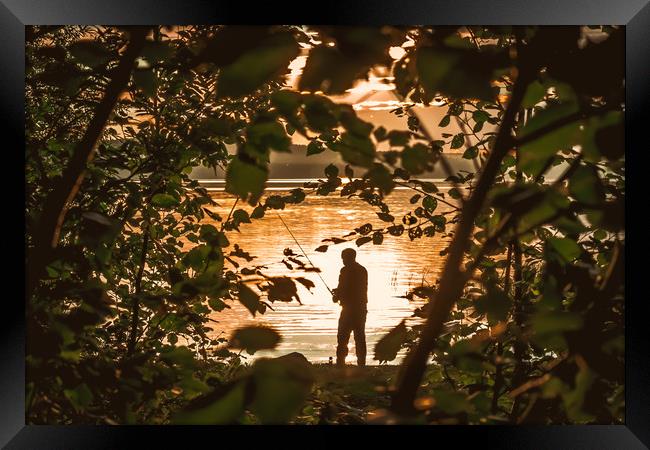 Fishing at sunset Framed Print by Svetlana Korneliuk