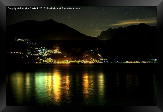  Lights across the water Framed Print by Claire Castelli