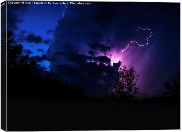 purple lightning between clouds Canvas Print by Eric Fouwels