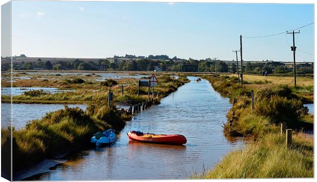  Paddling down the road - Brancaster Norfolk on th Canvas Print by Gary Pearson