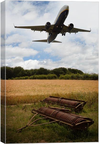  Plane Over Cornfield Canvas Print by Adrian Wilkins