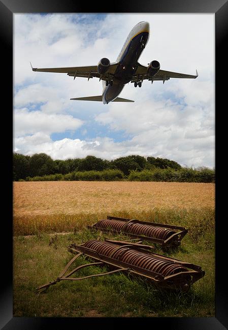  Plane Over Cornfield Framed Print by Adrian Wilkins