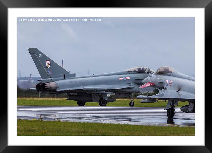 Pair of RAF Typhoons on the runway Framed Mounted Print by Jason Wells