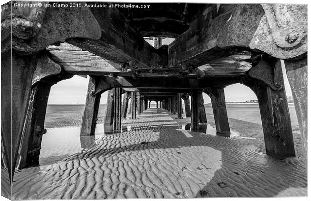  Under the pier Canvas Print by Ian Clamp