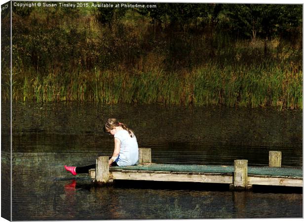 Relaxing on a jetty Canvas Print by Susan Tinsley
