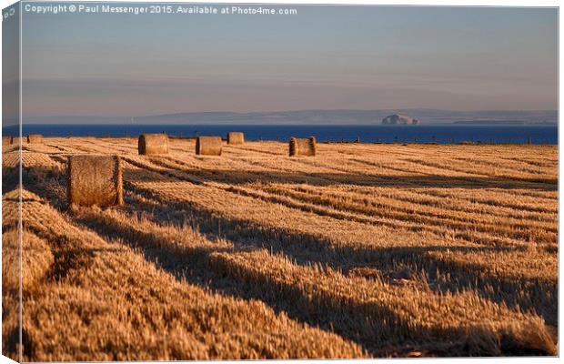  Hay Bails with Bass Rock Canvas Print by Paul Messenger