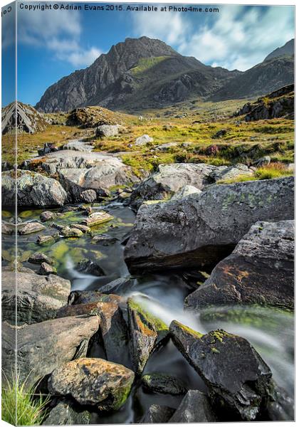 Clouds Over Tryfan Canvas Print by Adrian Evans