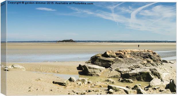  Rocky outcrop near Mont St Michel in Normandy Fra Canvas Print by Gordon Dimmer