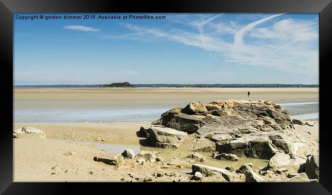  Rocky outcrop near Mont St Michel in Normandy Fra Framed Print by Gordon Dimmer