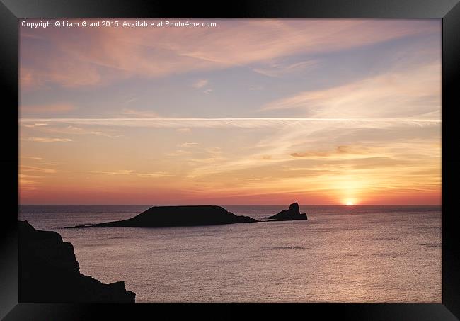 Worms Head at sunset. Wales, UK. Framed Print by Liam Grant