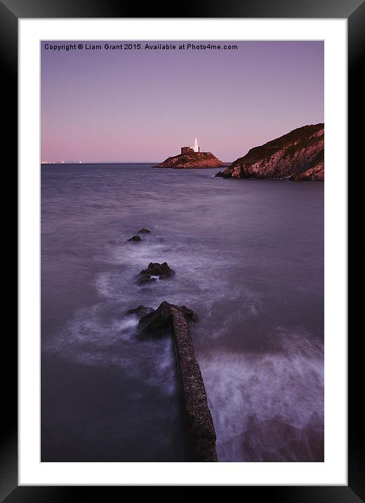 Lighthouse at dusk. Mumbles, Wales, UK. Framed Mounted Print by Liam Grant