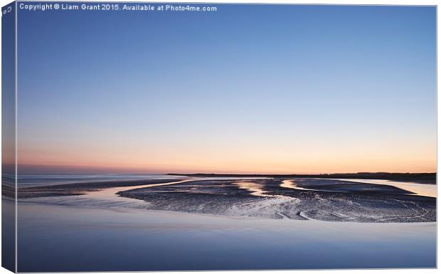 Colourful twilight sky at low tide. Burry Port, Wa Canvas Print by Liam Grant