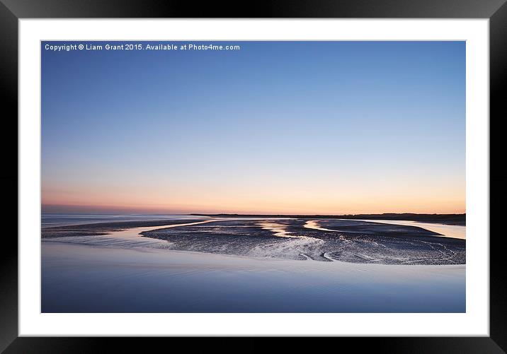 Colourful twilight sky at low tide. Burry Port, Wa Framed Mounted Print by Liam Grant