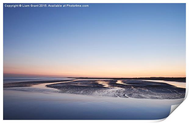 Colourful twilight sky at low tide. Burry Port, Wa Print by Liam Grant