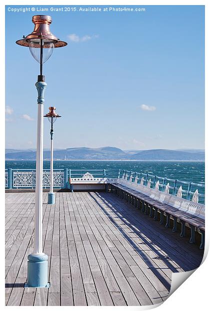 Lamp and seating on Mumbles Pier. Wales, UK. Print by Liam Grant