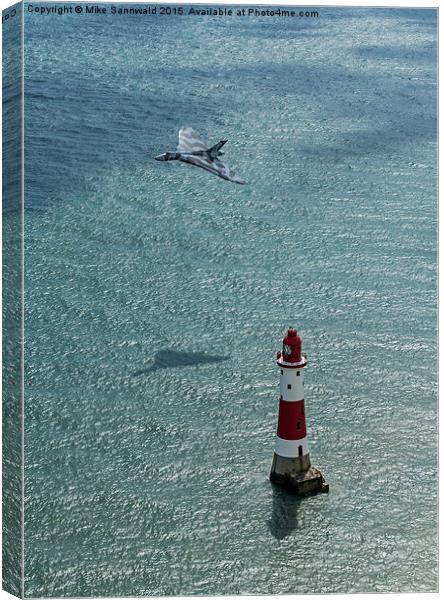  Avro Vulcan low pass over Eastbourne lighthouse Canvas Print by Mike Sannwald