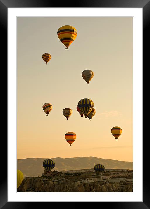 Hot air balloons in Cappadocia, Turkey Framed Mounted Print by Mike Sannwald
