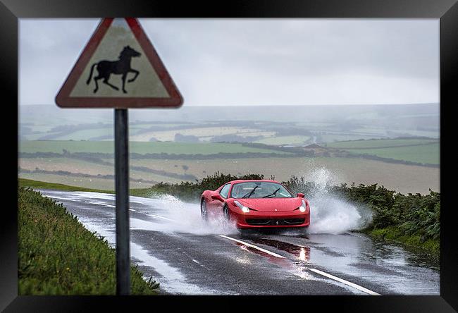  Ferrari 458 Spider driving through a puddle Framed Print by Mike Sannwald