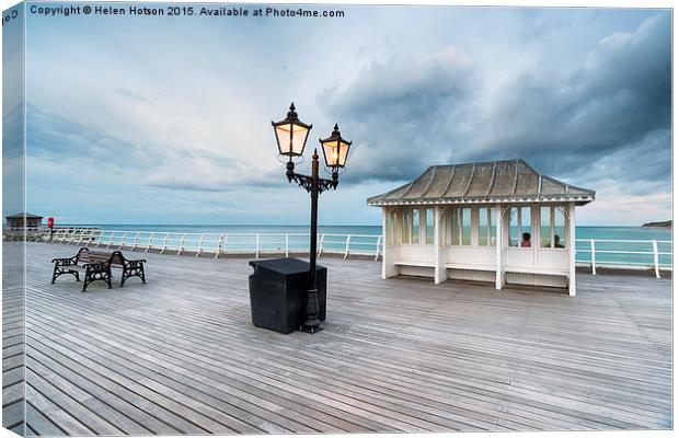 Dusk at the Pier Canvas Print by Helen Hotson