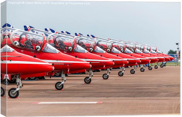 Red Arrows lined up on the ground Canvas Print by Jason Wells