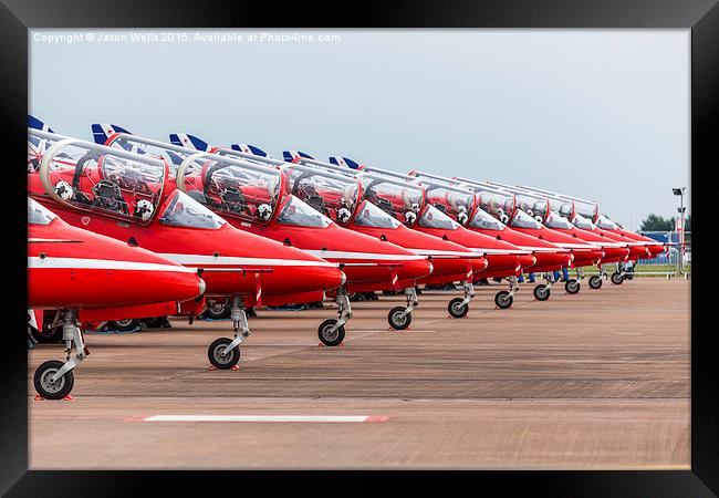 Red Arrows lined up on the ground Framed Print by Jason Wells