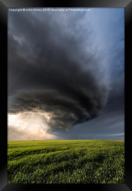 Structure over the great plains of Colorado, USA. Framed Print by John Finney