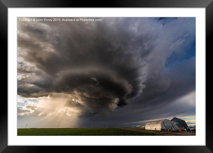  Structure over the great plains of Colorado, USA. Framed Mounted Print by John Finney