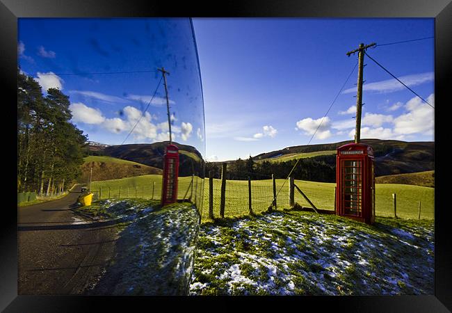 Red phonebooth and Scottish landsape reflecting in Framed Print by Gabor Pozsgai