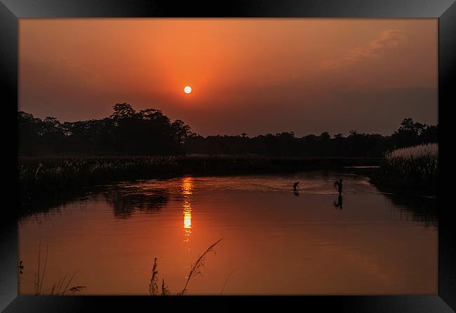 A beautiful Sunset and its reflection in water Framed Print by Shreeram Khatri