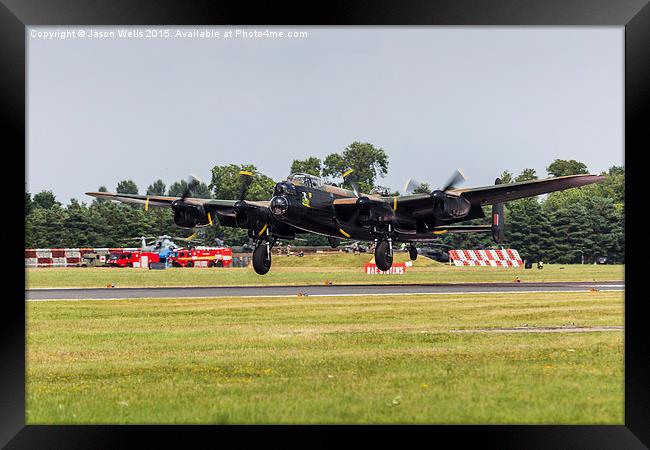 Avro Lancaster landing at RAF Fairford Framed Print by Jason Wells