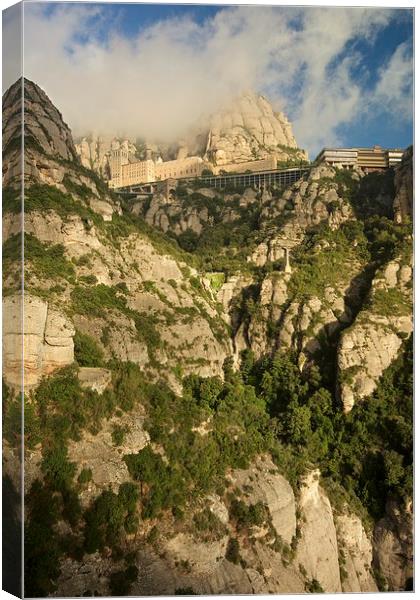  Clouds hover over Montserrat Canvas Print by Stephen Taylor