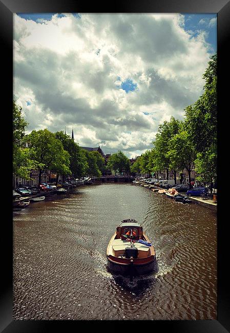 Boat over the canal, Amsterdam Framed Print by Adam Szuly