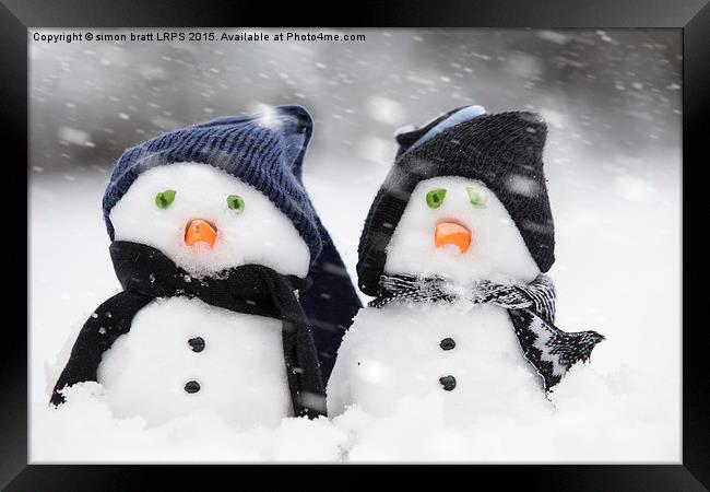 Two cute snowmen dressed for winter Framed Print by Simon Bratt LRPS
