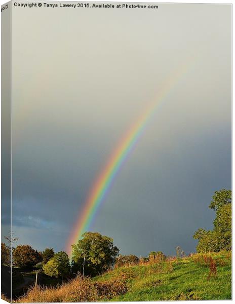  Rainbow and rain clouds Canvas Print by Tanya Lowery