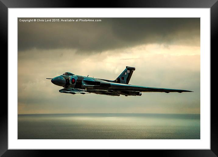   Vulcan XH558 Over The Sea Framed Mounted Print by Chris Lord