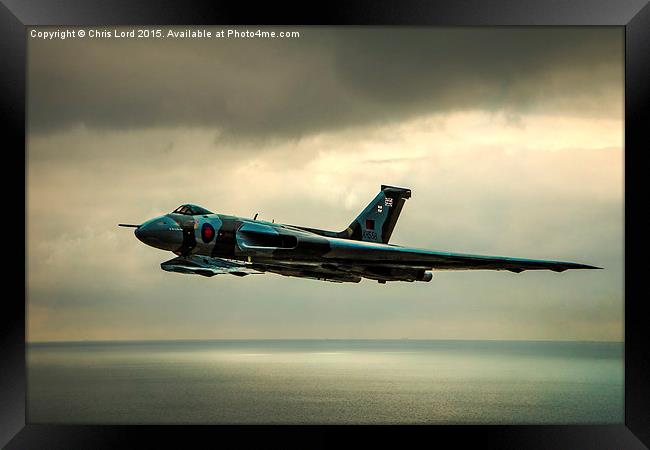   Vulcan XH558 Over The Sea Framed Print by Chris Lord