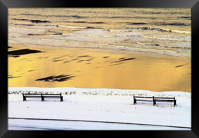  Whitby Sun. Sea, Sand and Snow Framed Print by Paul M Baxter