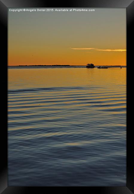 Boat and dock at dusk  Framed Print by Angelo DeVal