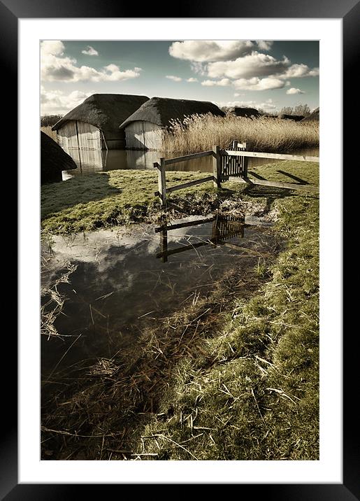 Thatched boat sheds on Hickling Broad Framed Mounted Print by Stephen Mole