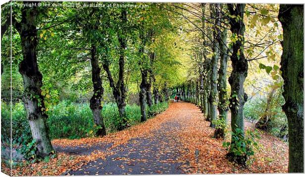 HAND IN HAND THROUGH THE AVENUE OF AUTUMN  Canvas Print by len milner