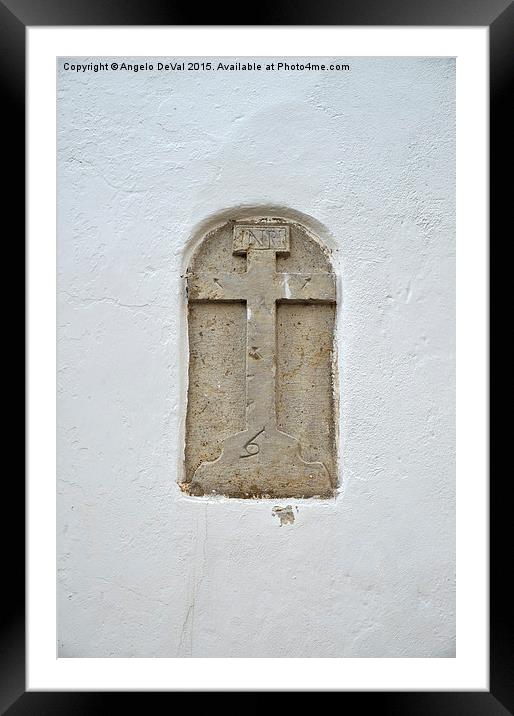 Church cross sculpted in stone  Framed Mounted Print by Angelo DeVal