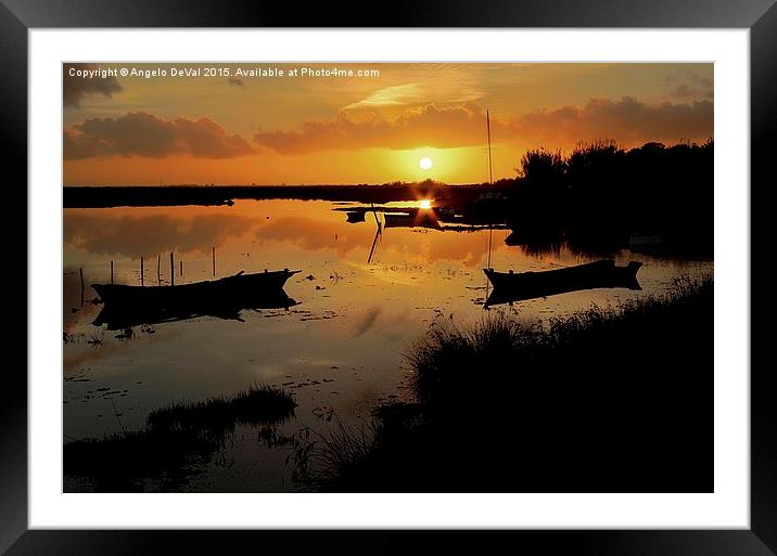 Boats silhouettes at sunset  Framed Mounted Print by Angelo DeVal